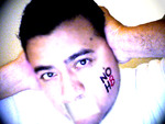 Gilbert Gonzalez Jr - Gilbert Gonzalez Jr makes a homemade "NoH8" campaign photo.