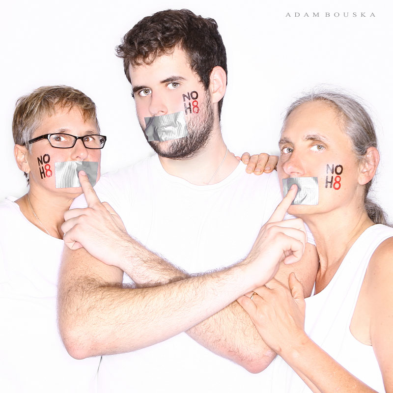 Zach Wahls and Moms pose for NoH8