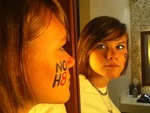 Haley Drozdowicz - This was taken after the NO H8 photoshoot in Milwaukee, Wisconsin.  The desperation for LGBTAQIQ equality is reflected in the mirror's glare. <3