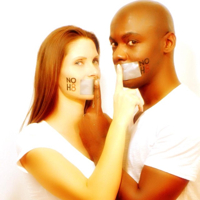 Michael Ezell - As an interracial couple and members of a very mixed and modern family in central Texas, the Ezell/ O'Donnell household decided to celebrate our unique family with a NOH8 Campaign photo shoot.
I hired an amazing photographer in Nakita Santiago! We popped popcorn, drank wine and danced to the rhythm of music as we celebrated our "coming out" in a way that also supports equality for ALL people. Michael Ezell - As an interracial couple and members of a very mixed and modern family in central Texas, the Ezell/ O'Donnell household decided to celebrate our unique family with a NOH8 Campaign photo shoot.
I hired an amazing photographer in Nakita Santiago! We popped popcorn, drank wine and danced to the rhythm of music as we celebrated our "coming out" in a way that also supports equality for ALL people.
