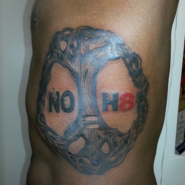 Henry Hill - Though this is not your typical logo style, I thought I would submit this anyway! I love who I am and feel that this campaign perfectly expresses how I feel about me and the rest of the gay community; banding together to support each other! So I consulted with my tattoo artist and came up with this tree of life with the NoH8 insignia and equality symbol in the trunk! Hope I am able to share this on the page!!! (I can also attach a face pic with a story but I wanted to see if this would fly) Thanks for considering it!!! -Henry