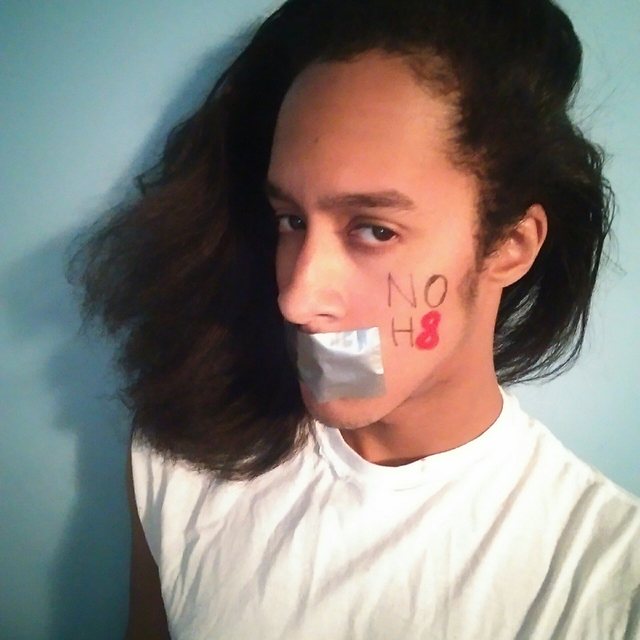 TJ - Growing up it wasn't easy living in the area of Washington D.C. that I lived in. I was continuously teased, taunted and bullied in and outside of school due to the fact that I'm gay. I always knew that I were attracted to the same sex but at that young of an age I didn't know the term for being who I am until the bullying started. After being verbally abused and called multiple names I quickly asked and researched what being gay was, then coming to the realization of the name of who I am and why being who I am is such an epidemic. I appreciate having a campaign such as the NOH8 campaign because it gives people of all ages that are going through negative circumstances with their sexuality that they're not alone and to just be comfortable with themselves and hopefully be an inspiration unto others going through the same. TJ - Growing up it wasn't easy living in the area of Washington D.C. that I lived in. I was continuously teased, taunted and bullied in and outside of school due to the fact that I'm gay. I always knew that I were attracted to the same sex but at that young of an age I didn't know the term for being who I am until the bullying started. After being verbally abused and called multiple names I quickly asked and researched what being gay was, then coming to the realization of the name of who I am and why being who I am is such an epidemic. I appreciate having a campaign such as the NOH8 campaign because it gives people of all ages that are going through negative circumstances with their sexuality that they're not alone and to just be comfortable with themselves and hopefully be an inspiration unto others going through the same.